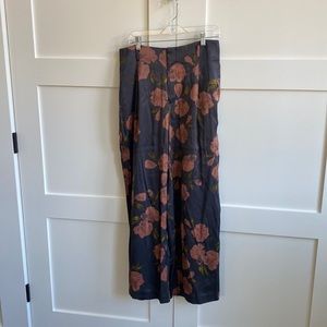Gray and peach floral wide leg satin pants.